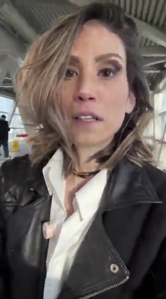 Jess walks through subway